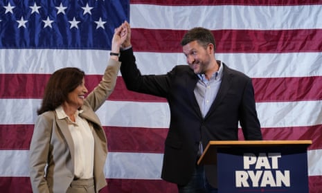 Democratic candidate Pat Ryan, right, and New York Gov Kathy Hochul appear on stage together during a campaign rally for Ryan, on Monday, in Kingston, New York.