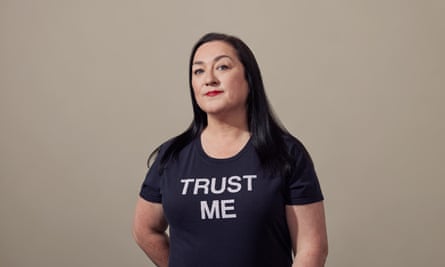 Portrait of Jenny Radcliffe wearing a T shirt with “Trust Me” written on it.