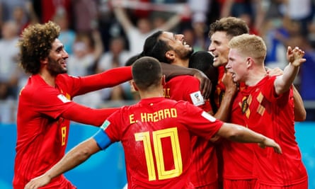Nacer Chadli is surrounded by teammates after his winner for Belgium against Japan in the 2018 World Cup last 16