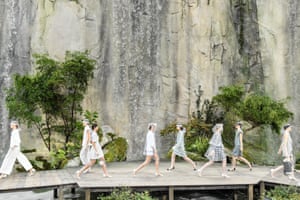 Models, wide shot, walk the runway during the finale of the Chanel Paris show