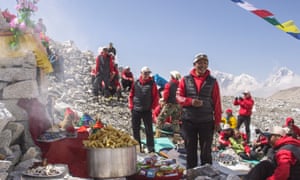 Guides and climbers at Everest base camp in a film still from Sherpa