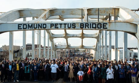 Vice-president Kamala Harris and civil rights leaders ceremonially cross the Edmund Pettus Bridge in Selma, Alabama, on 6 March, to commemorate the 57th anniversary of Bloody Sunday.
