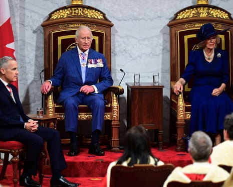 Mark Carney, King Charles III and Queen Camilla on the Senate floor before a speech to mark the state opening of the Canadian parliament of Canada.