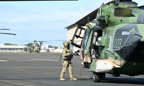 Australian military helicopter crash navy divers join search for