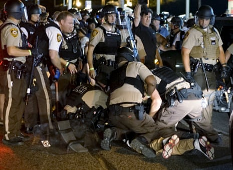 Police detain a protester in Ferguson, Missouri.