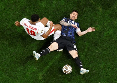 Jude Bellingham collides with Lionel Messi during a fractious first half