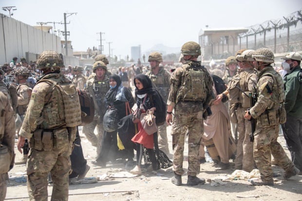 British and US soldiers help evacuate British nationals and former British staff eligible for relocation, Kabul Airport, 21 August 2021