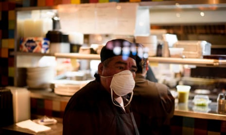 A restaurant cook at Arnaldo Richards’ Picos in Houston in May. Private businesses can tell customers to wear masks, but unlike earlier this year, they have no statewide mandate to back them up.