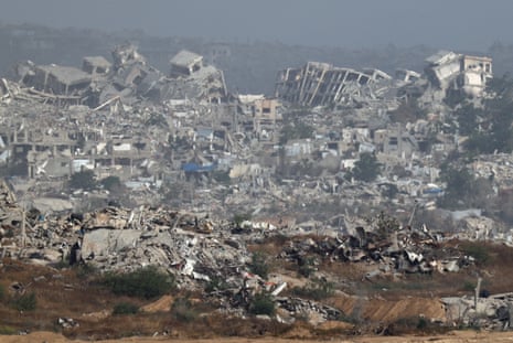 A general view shows destruction caused by Israeli bombardment of North Gaza, as seen from Israel.