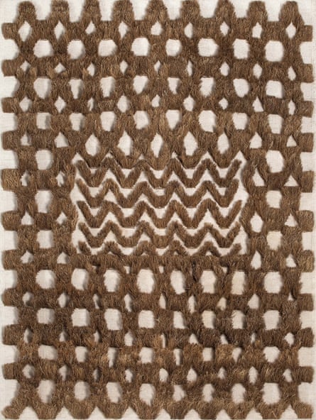 A geometric woven design in some natural material