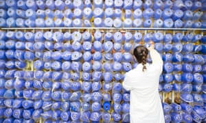 A worker wearing a mask rushes to make foreign trade orders on the production line of the textile company in Haian City, Jiangsu Province, China amidst the global coronavirus pandemic, on 8 April 2020.