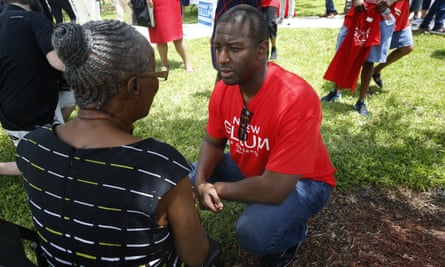 Andrew Gillum talks with a supporter after speaking to voters and public school teachers at a rally in Miami Gardens in August.