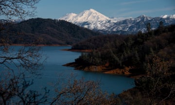 GUARDIAN_ShastaCo<br>Mt. Shasta sits above Shasta Lake north of Redding, Calif. on March 30, 2023. The population of Shasta County is 182,155, with an average population of 48.2 people per square mile, according to the 2020 U.S. Census.