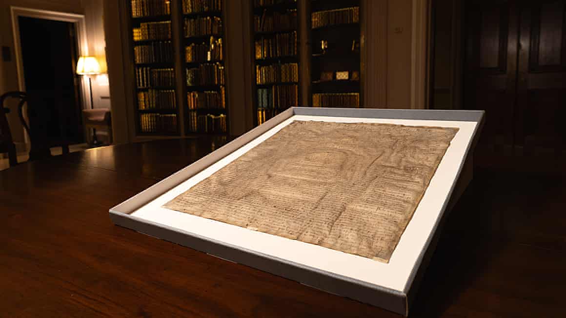 Magna Carta on display in a large frame