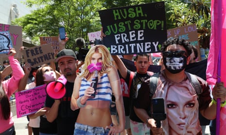 Britney Spears fans gather outside the courthouse in Los Angeles for the hearing on the pop singer’s conservatorship on 23 June. 