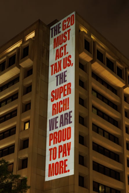Banner reading: The G20 must act. Tax us, the super rich! We are proud to pay more