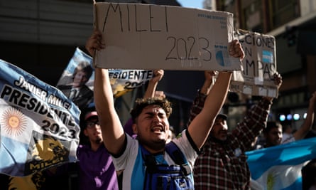 Supporters of presidential candidate Javier Milei gather outside his headquarter during the presidential runoff election in Buenos Aires, Argentina