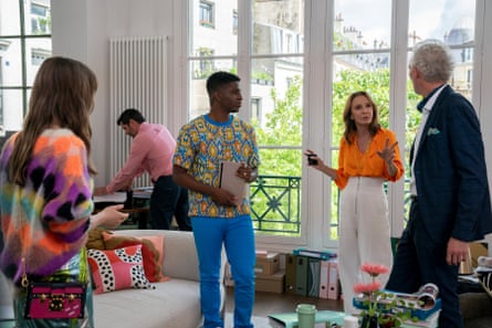 (From left) Emily (Lily Collins), Julien (Samuel Arnold) as Julien, Sylvie (Philippine Leroy-Beaulieu) and Luc (Bruno Gouery) in Emily in Paris