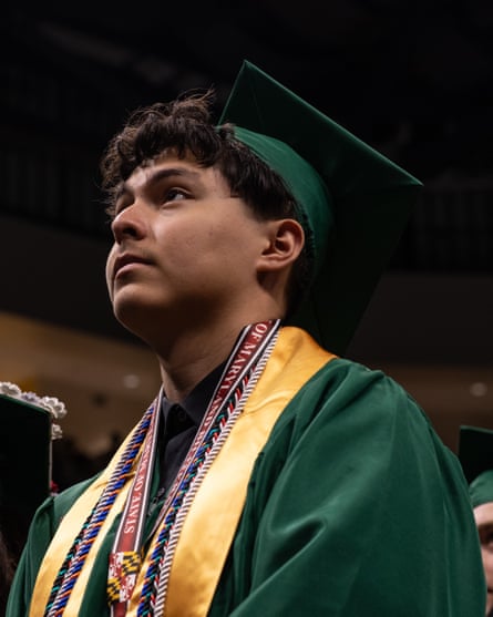 a young man looking left