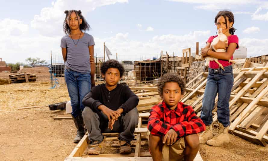 The Stewart children Nay, J5, JG, and Zey hang out at Southwest Black Ranchers.