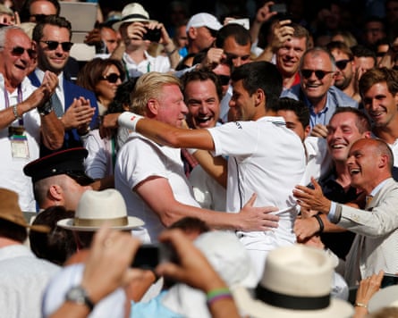 Novak Djokovic hugs Boris Becker in the players box after winning the 2014 Wimbledon men’s singles final against Roger Federer