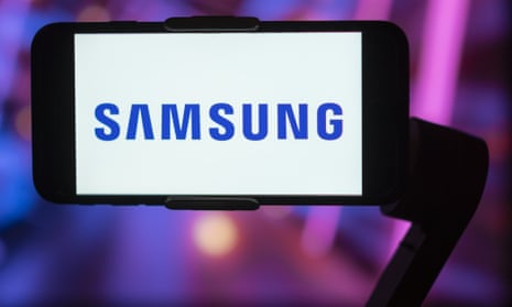 Samsung logo is seen on a mobile phone screen.