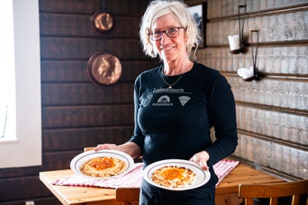Waffles with cloudberry jam are served in Låktatjåkko mountain hut.