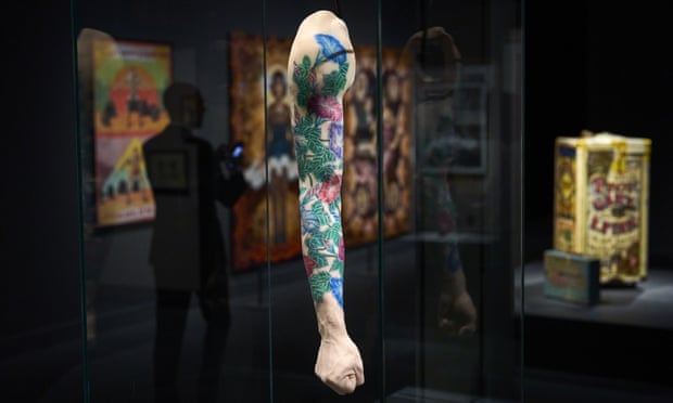 A full-sleeve tattoo is displayed at the exhibition Tattoo. Art on the Skin at CaixaForum in Barcelona,  Spain.