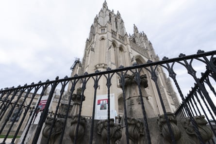 view of cathedral rising over fence