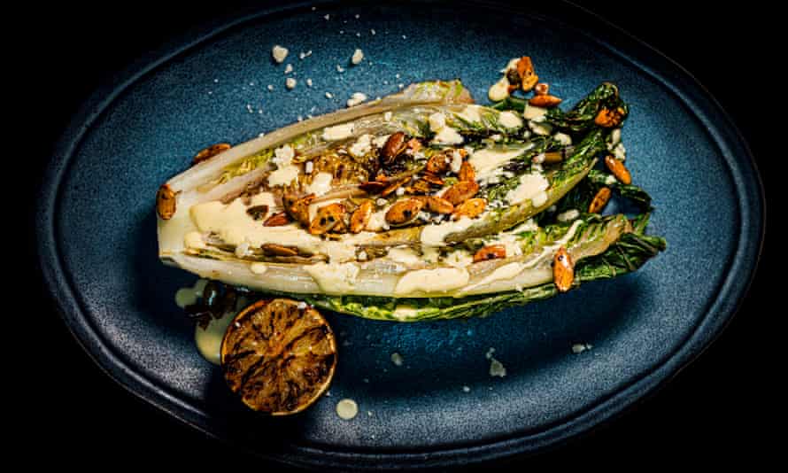 Grilled hearts of romaine with chilli pumpkin seeds.