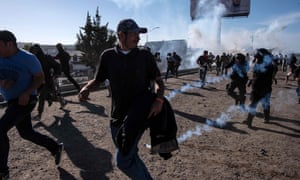 The arrests came amid clashes with members of a migrant caravan attempting to enter the US from Tijuana. 6000.jpg?width=300&quality=85&auto=forma