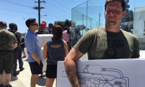 Jeremy Cross displays his purchase outside the Boring Company’s HQ in Los Angeles.
