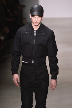 A model presents Calvin Klein’s bomber jacket-centric autumn/winter 2015 collection.
