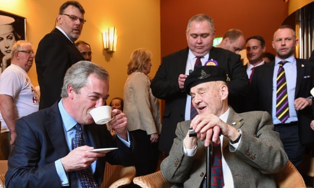 Nigel Farage has a cup of tea with World War II veteran William Curtis after giving a speech on defence at Himley Hall, near Dudley.