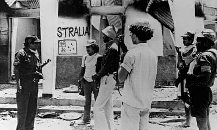 Indonesian troops at the house in which Australian journalists Greg Shackleton and Malcolm Rennie, cameramen Gary Cunningham and Brian Peters, and sound recordist Tony Stewart sheltered before dying while trying to capture images of Indonesian troops as they invaded Balibo in 1975