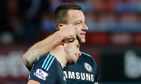 Chelsea’s John Terry and César Azpilicueta celebrate after their side’s win over West Ham at Upton Park.