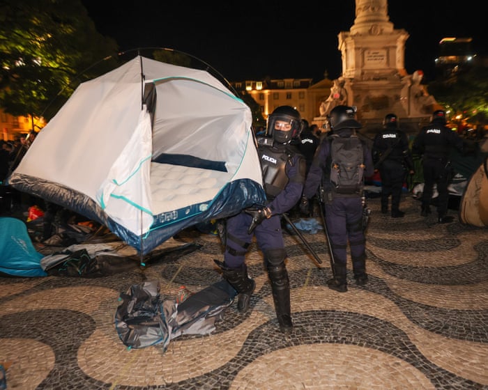 Police in Portugal ‘use dogs and batons’ to dismantle housing protest camps