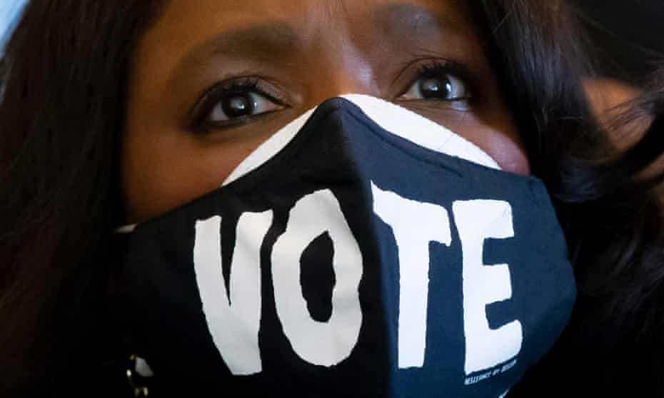 Democratic representative of Alabama Terri Sewell wears a face mask that reads 'Vote' while joining other members of the Congressional Black Caucus (CBC) calling on the US Senate to pass voting rights legislation on Capitol Hill on 19 January 2022.
