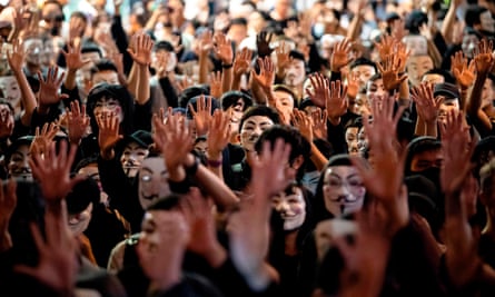 PProtesters wear Guy Fawkes masks, popularised by the V For Vendetta comic-book film, as they gather in Hong Kong’s Kowloon district in 2019