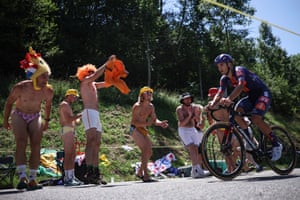 Team Picnic PostNL team’s Pavel Bittner is cheered by spectators as he cycles past.