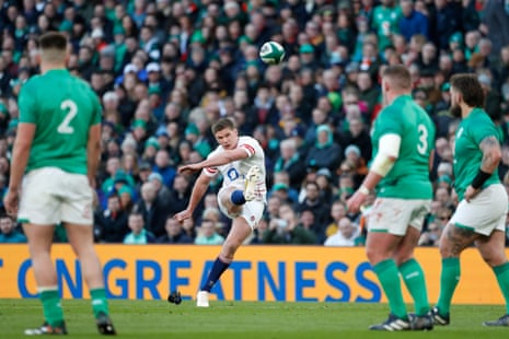 England's Owen Farrell kicks a penalty.