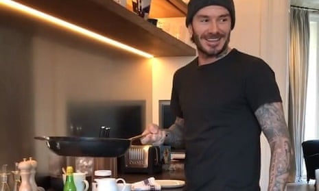 David Beckham making pancakes in a kitchen