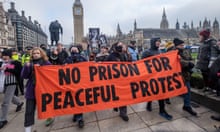 Protest march in support of jailed Just Stop Oil activists outside the houses of parliament