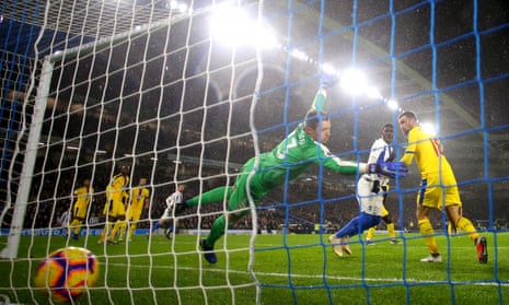 Leon Balogun scores Brighton’s second goal and leaves Wayne Hennessey groping at thin air.