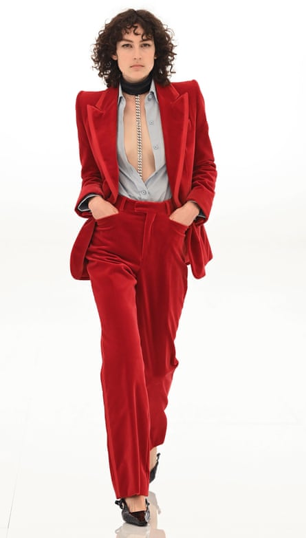 model in a red velvet suit