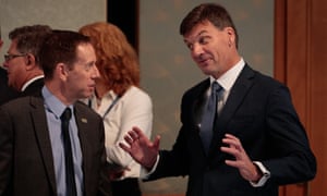 Shane Rattenbury (left) in discussion with the federal minister for energy and emissions reduction, Angus Taylor