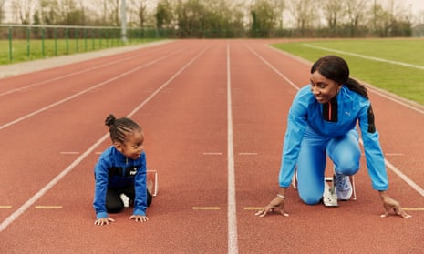 Bianca Williams and her son ZL, four, on a running track