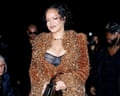 Rihanna smiles at a fashion show