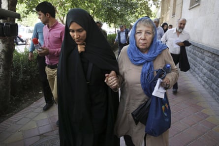 Mary Rezaian, mother of detained Washington Post correspondent Jason Rezaian, right, and Jason’s wife Yeganeh leave a Revolutionary Court building in Tehran.