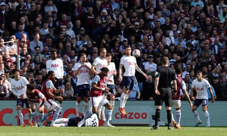 Douglas Luiz lifts a free-kick over the Tottenham wall to give Villa a 2-0 lead.